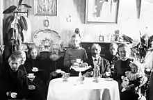 Anders Truedsson Selander  & family  in Söderhamn c 1916, seated for a fika (coffee drinking)
