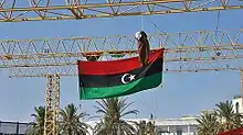 Image 10An effigy of Muammar Gaddafi hangs from a scaffold in Tripoli's Martyrs' Square, 29 August 2011 (from History of Libya)