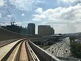 View of the station from the MRT tracks over the Damansara-Puchong Expressway.