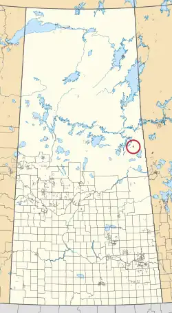 A map of the province of Saskatchewan showing 297 rural municipalities and hundreds of small Indian reserves. One is highlighted with a red circle.