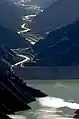View of the San Juan River leading into the Los Caracoles Dam. To the left is Ullúm Department across the northern border, while Zonda is visible on the right side of the river.