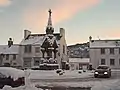The Cross, looking south, with the Dunkeld Detachment of the Black Watch drill hall behind it