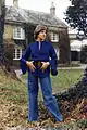 Image 46English girl in the mid-1970s wearing a wide-sleeved shirt, belted at the waist. (from 1970s in fashion)