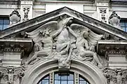 Nude figures restraining Pegasus
