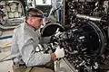 Expedition 35 Flight Engineer Chris Cassidy removes and replaces one of the Fuel Reservoirs with the MDCA Chamber Insert Assembly (CIA)