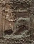 3B: The Buddha subjugating the elephant Nalagiri.