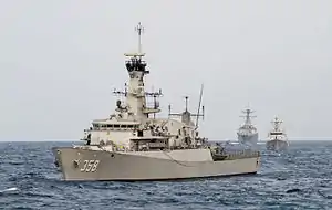 The Indonesian navy corvette KRI John Lie (358) lines up for a combined gunnery exercise behind the U.S. Navy littoral combat ship USS Fort Worth during the underway phase of CARAT Indonesia 2015.