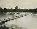 Treadway style infantry support bridge built on light aluminum pontons