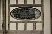 Leaded glass window, High Street, Saffron Walden. In this case the came is an integral part of the artistic composition.
