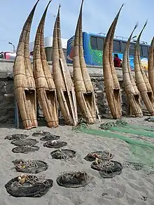 Peruvian fishing boatsIt shows the typical and ancient caballitos de totora