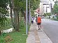 Walking track on Julita Pires Bretas Avenue, in the Santa Helena neighborhood, on the right bank of the stream.