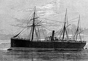 Large coal carrying boat with single funnel, seen from the port side.