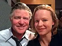Birch and Williams smiling to the camera