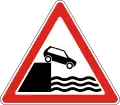Unprotected riverbank or quayside