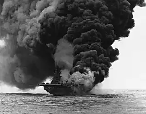 Smoke fills the sky as the fire rages on Bunker Hill on 11 May 1945