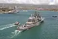 Vincennes pulls into port at Pearl Harbor, Hawaii, on 15 April 2005. USS Missouri is visible in the background.