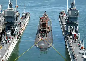 Arco (ARDM-5), an ARDM-5-class floating dry dock, servicing a Los Angeles-class submarine