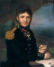 Half-length portrait of a man looking over his shoulder. His hair is thick and curly, and he wears a dark blue jacket with epaulettes and gold buttons, with a medals around his neck. In his hand he holds a compass, and in front of him is a chart.